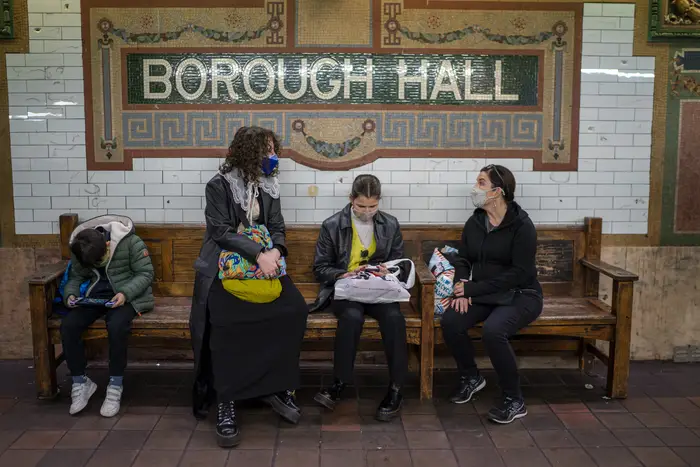 Passengers wait for a subway at Borough Hall in Brooklyn, Dec. 12, 2021. An NYU study ranks the station as having an extremely high level of particulate pollution.